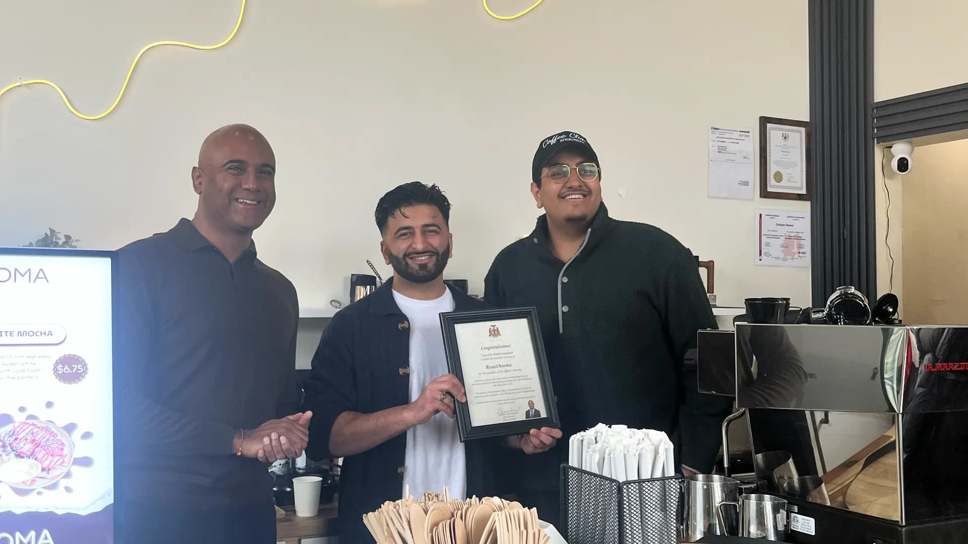 City Councillor congratulating RoastAroma founders
